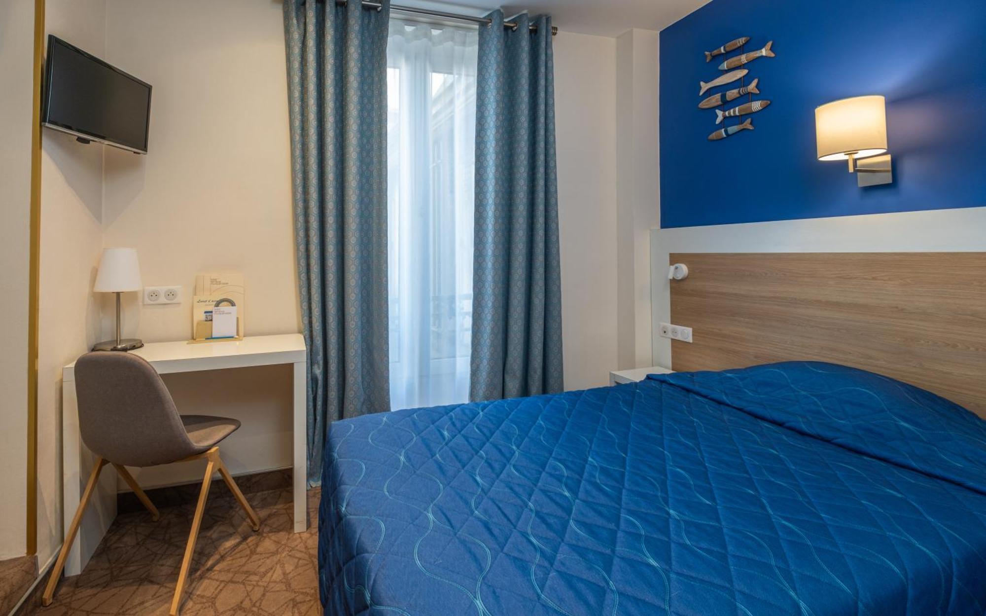 Hotel Terminus Montparnasse Paris Bagian luar foto
