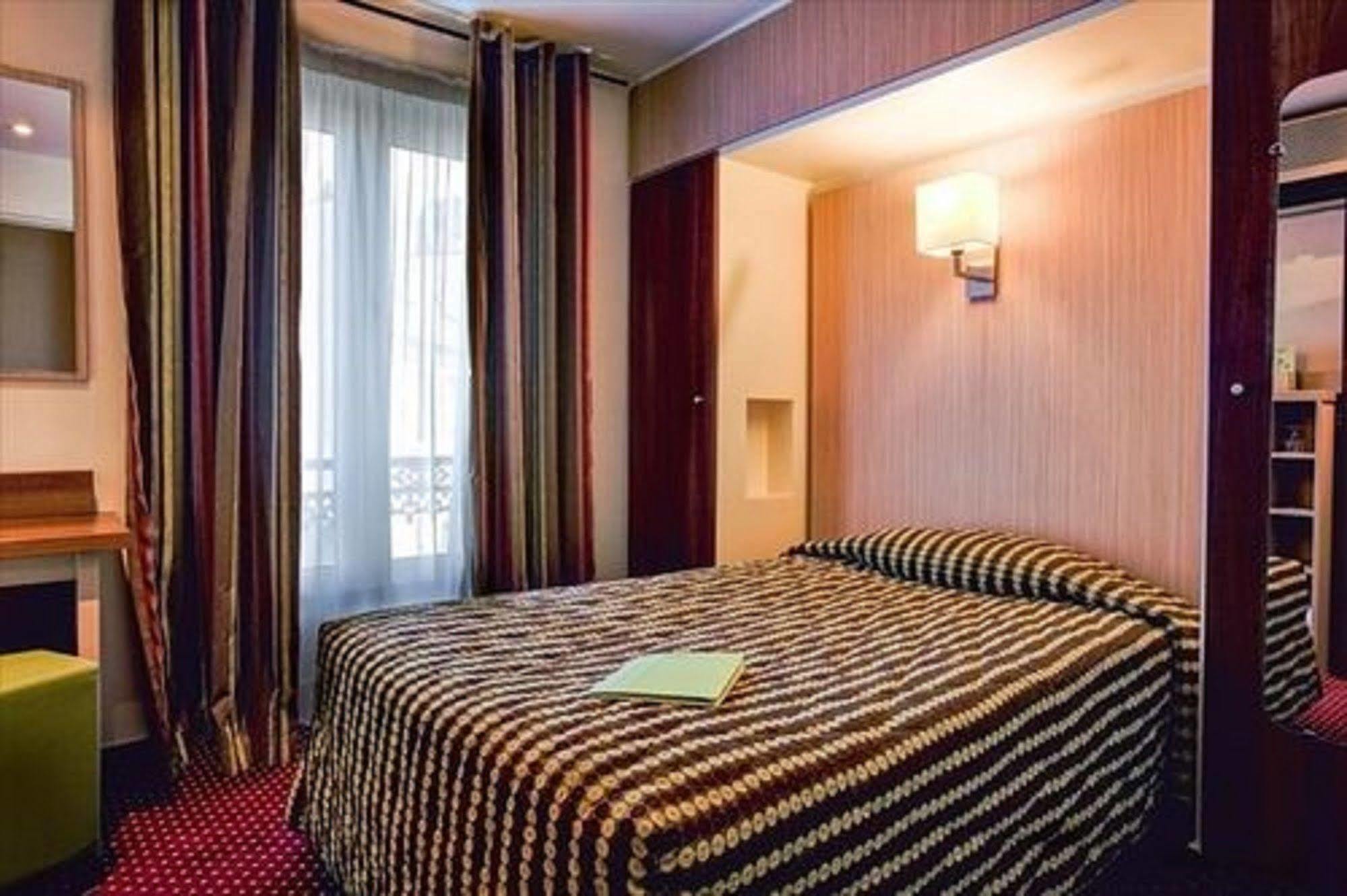 Hotel Terminus Montparnasse Paris Bagian luar foto